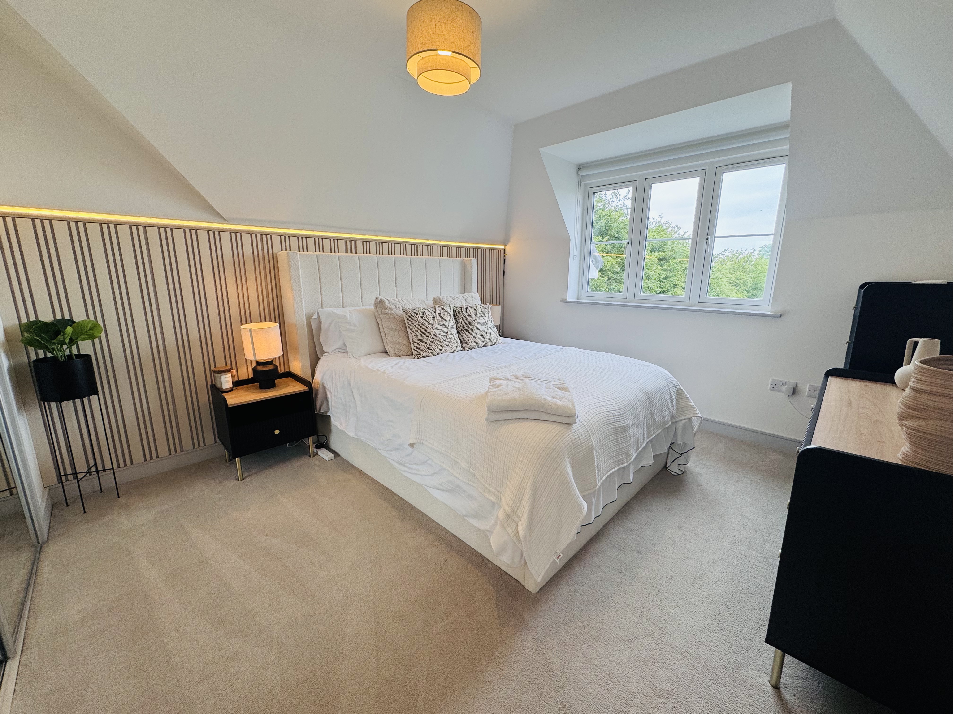 Bedroom with LED feature wall